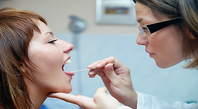 Diş Eti Büyümesi: Nedenleri, Belirtileri ve Tedavisi